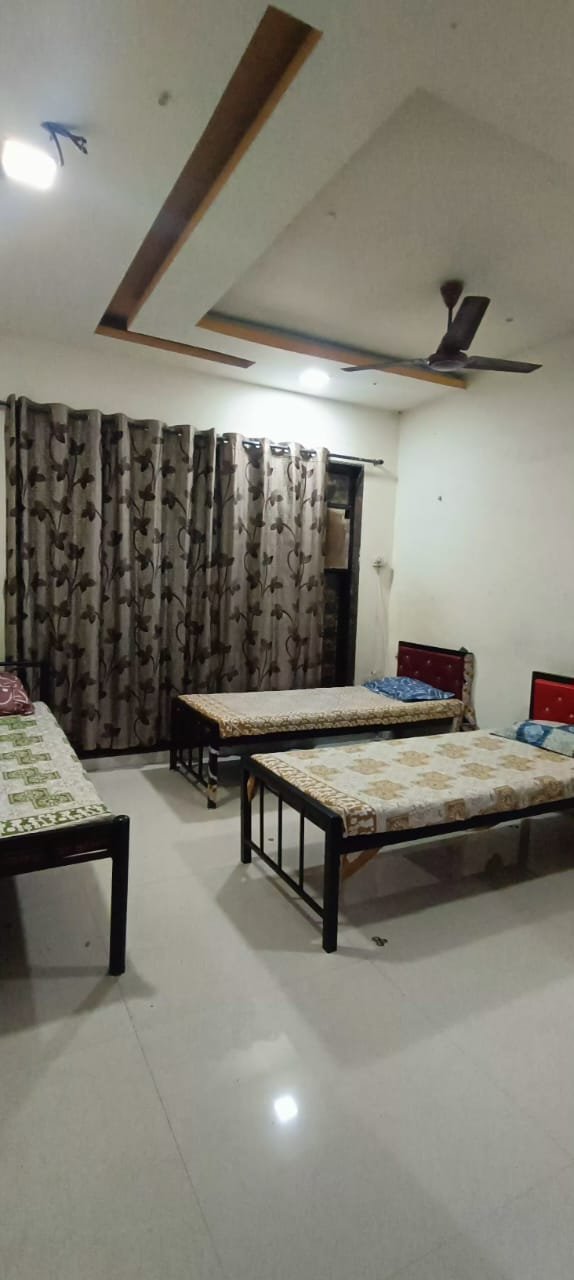 Twin sharing bedroom Sai Ganesh Elite Stay Airoli